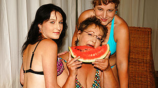 Three old and young lesbians getting wet